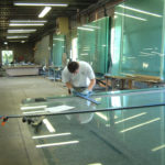 Glass repair service worker fixing glass