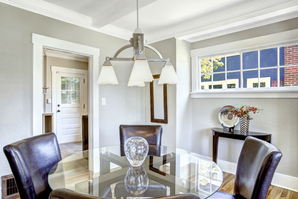 Pretty dining room with stunning glass table