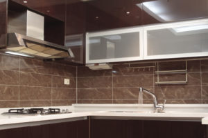 Modern kitchen with cabinet glass features